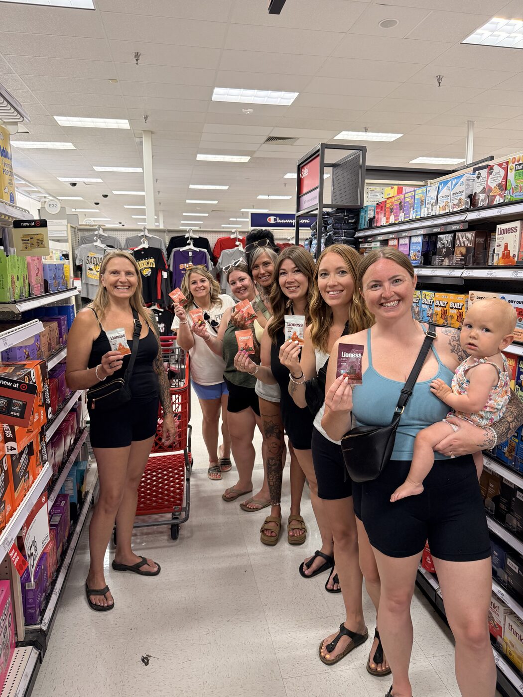 Friends with Lioness gummy fruit snacks in the snack aisle